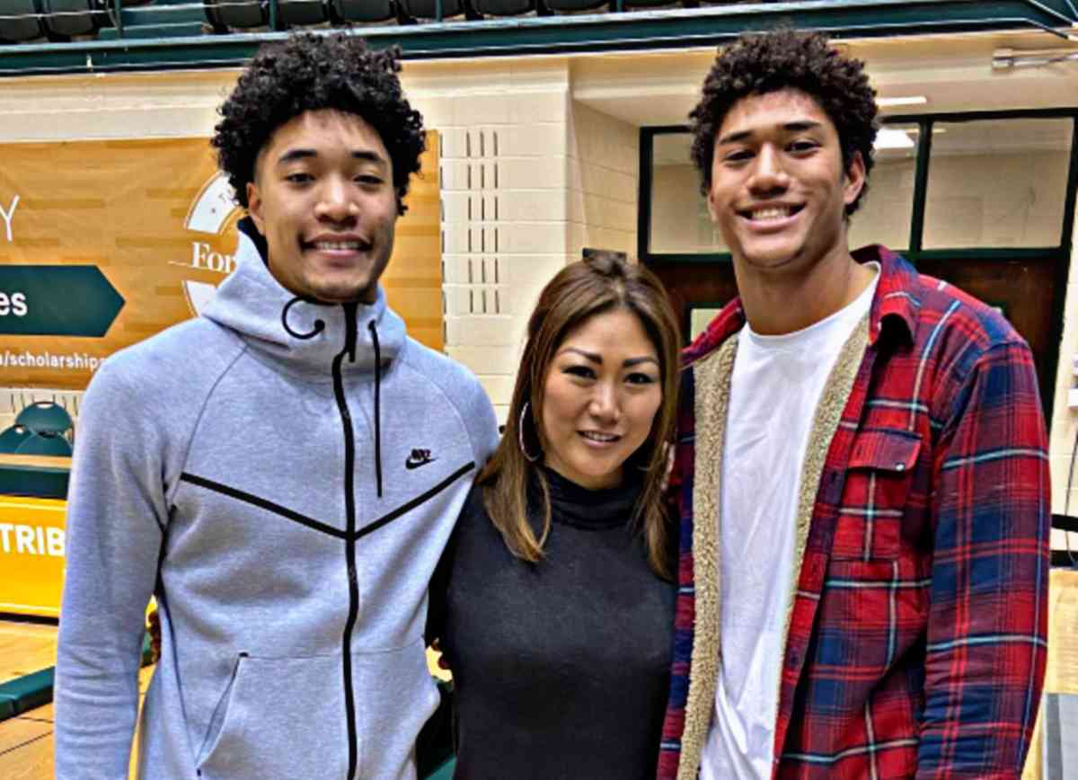 Kyle Hamilton (R) with his mom and brother