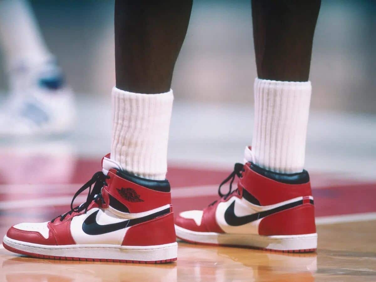 Michael Jordan wearing the Jordans (Via The Guardian)