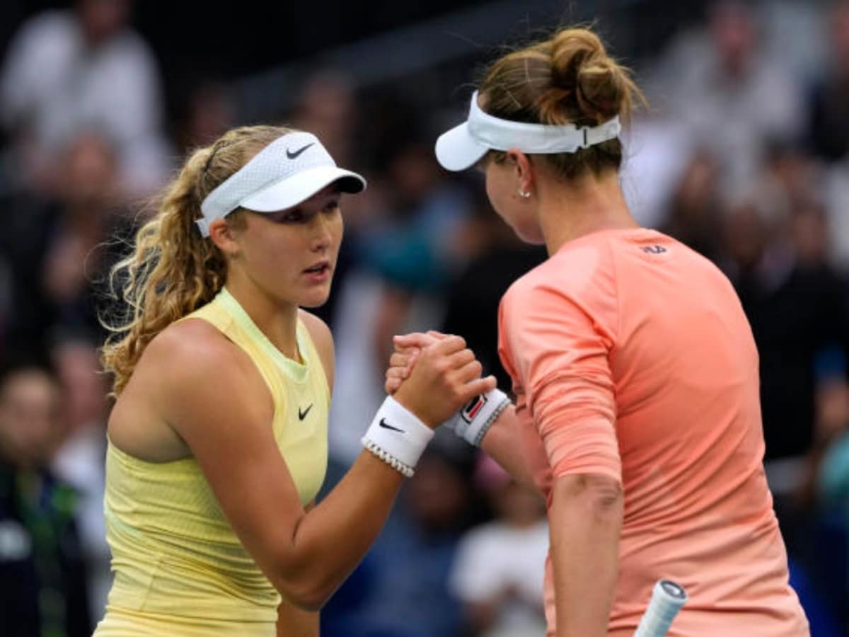 Mirra Andreeva and Barbora Krejcikova after the match 