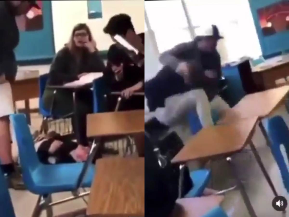 “He got a call from the WWE”- Social media shocked as video of guy getting viciously slammed from a table in a classroom fight surfaces online