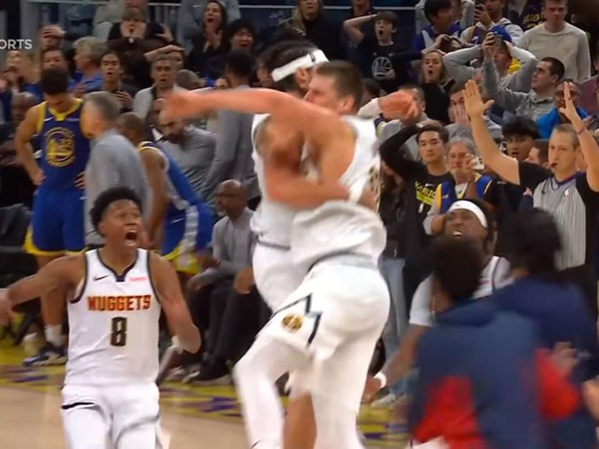 The Nuggets celebrate after Nikola Jokic drains the game winner from deep