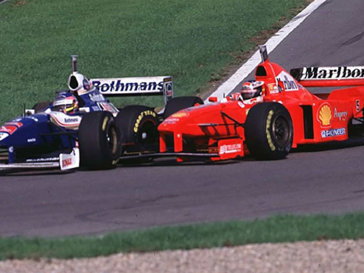 Michael Schumacher turns in on Jacques Villeneuve at 1997 European GP