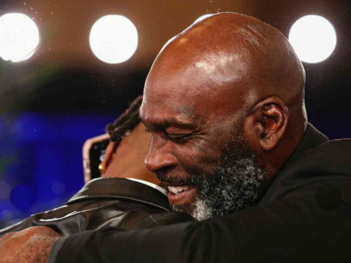 Zay Flowers shares a hug with his father Willie Flowers