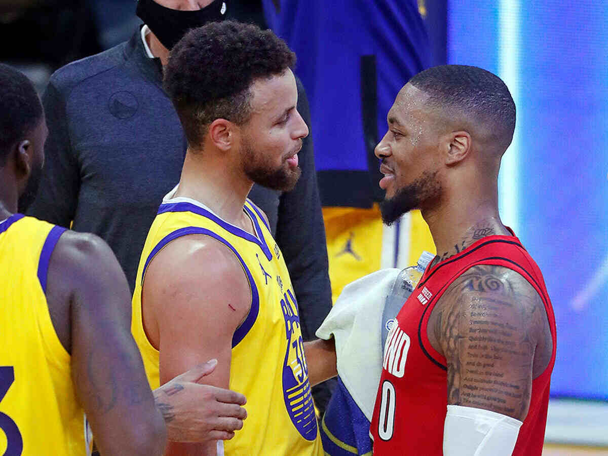 Stephen Curry and Damian Lillard (Via Sports Illustrated)