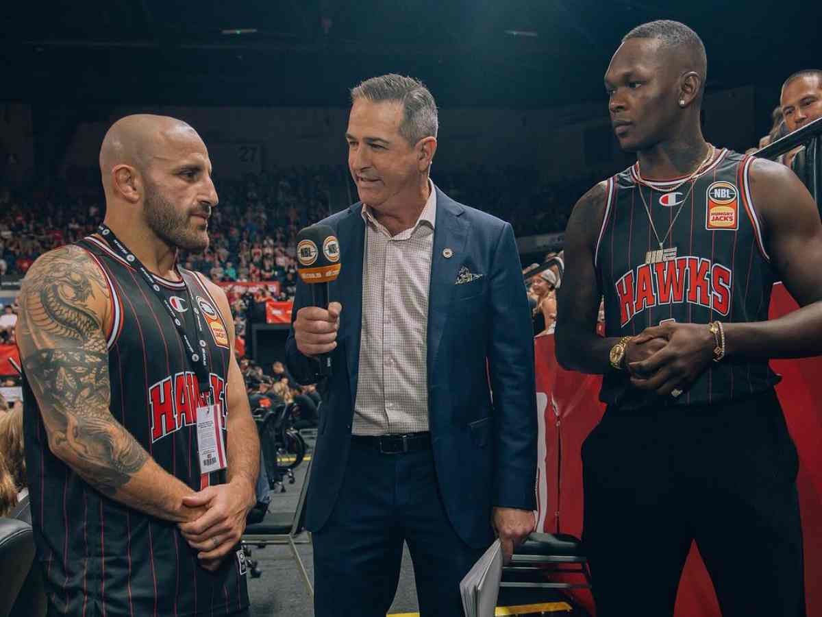 Alexander Volkanovski and Israel Adesanya at the NBA game between Atlanta Hawks and Phoenix Suns