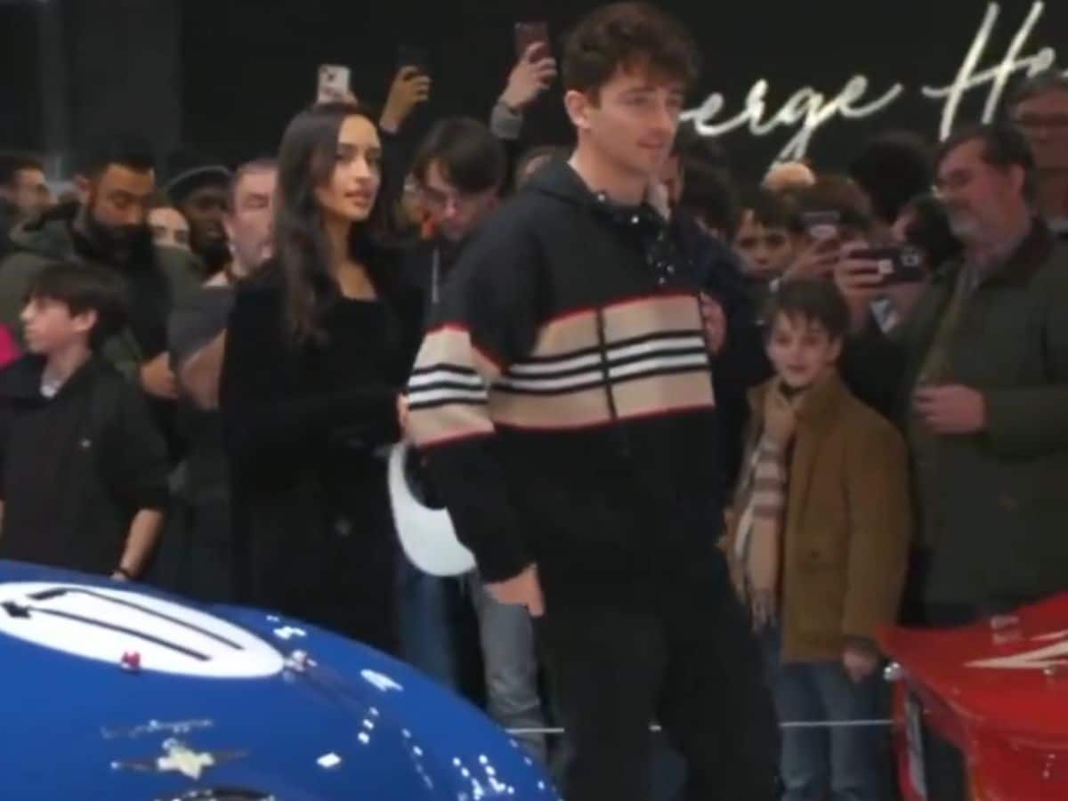 WATCH: Charles Leclerc tailed by girlfriend Alexandra Saint-Mleux as they visit luxury car exhibition in Paris