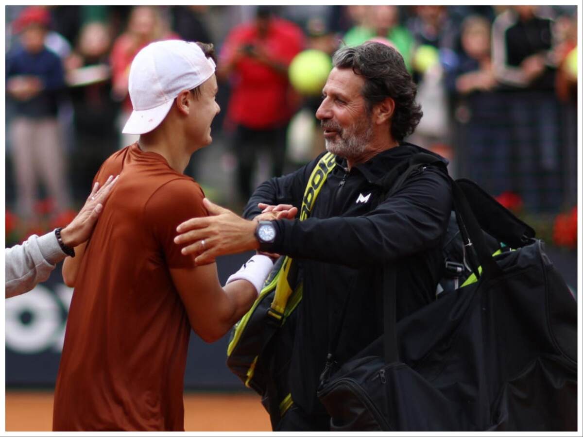 Holger Rune with his coach