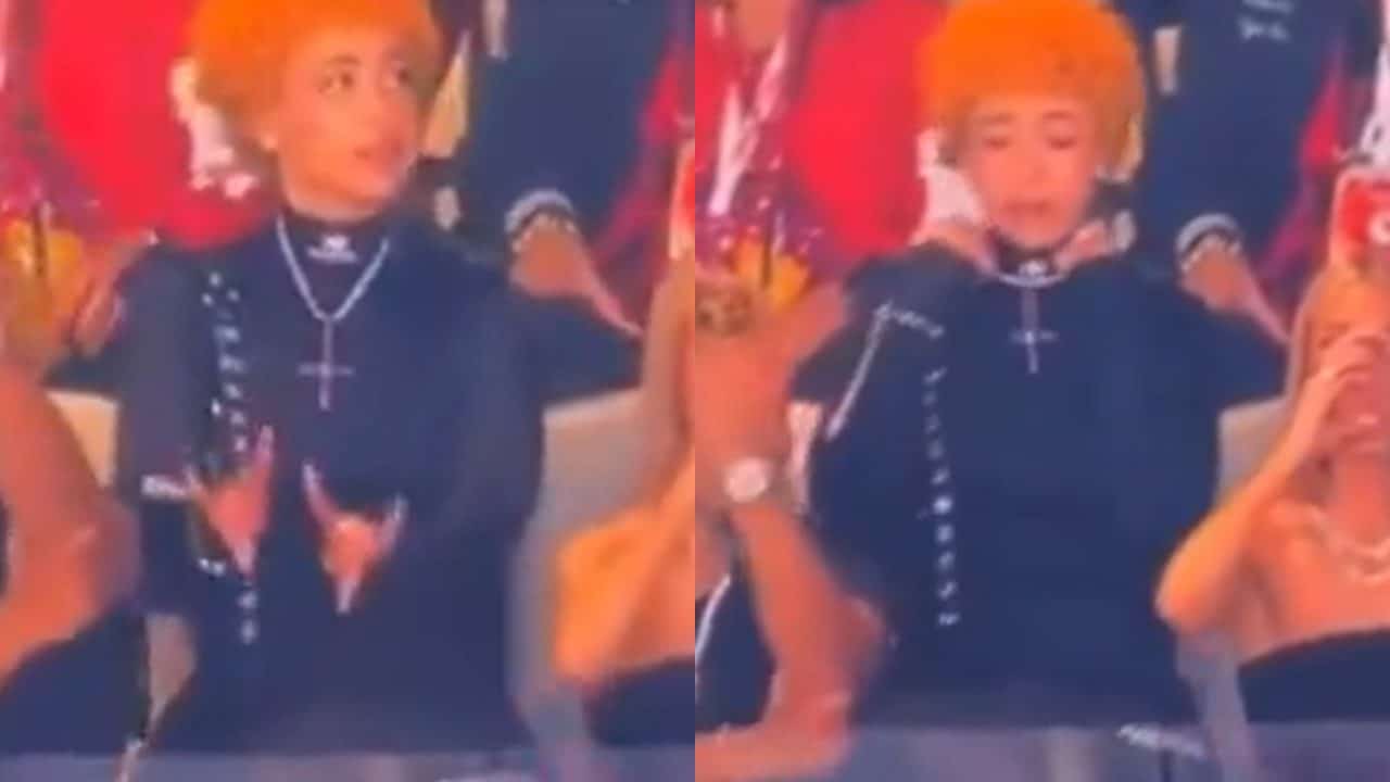 WATCH: “Taylor Swift pounding beers with satanists!” – Ice Spice allegedly throwing up demonic signs while wearing upside down cross during Super Bowl triggers WILD reactions on social media