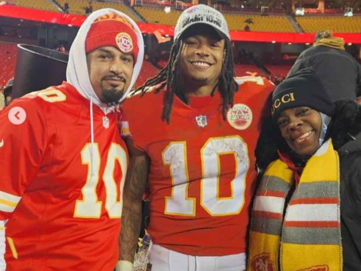 Isiah Pacheco with his parents