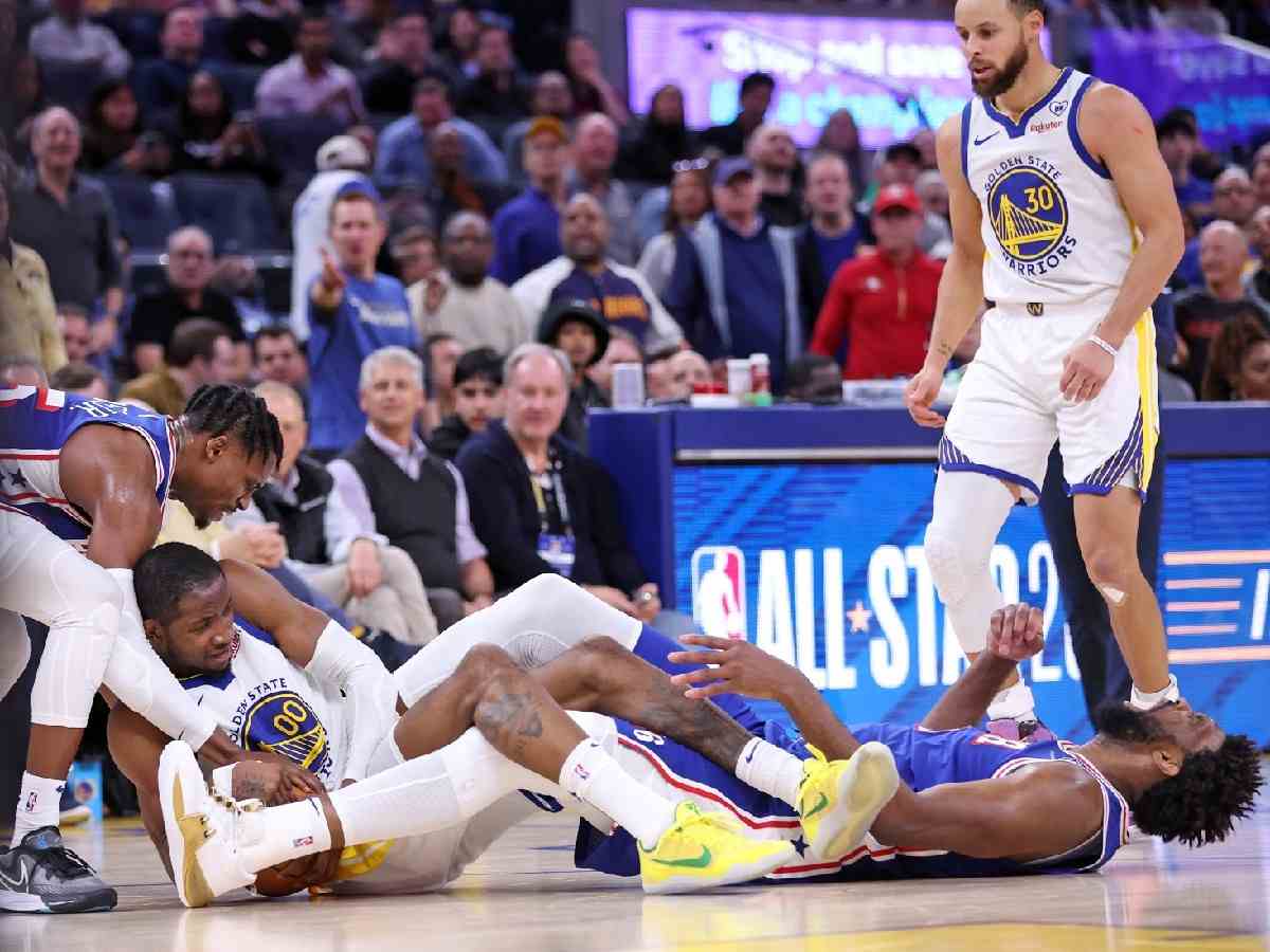 Joel Embiid's knee injury was aggravated during a lose ball clash against the Warriors