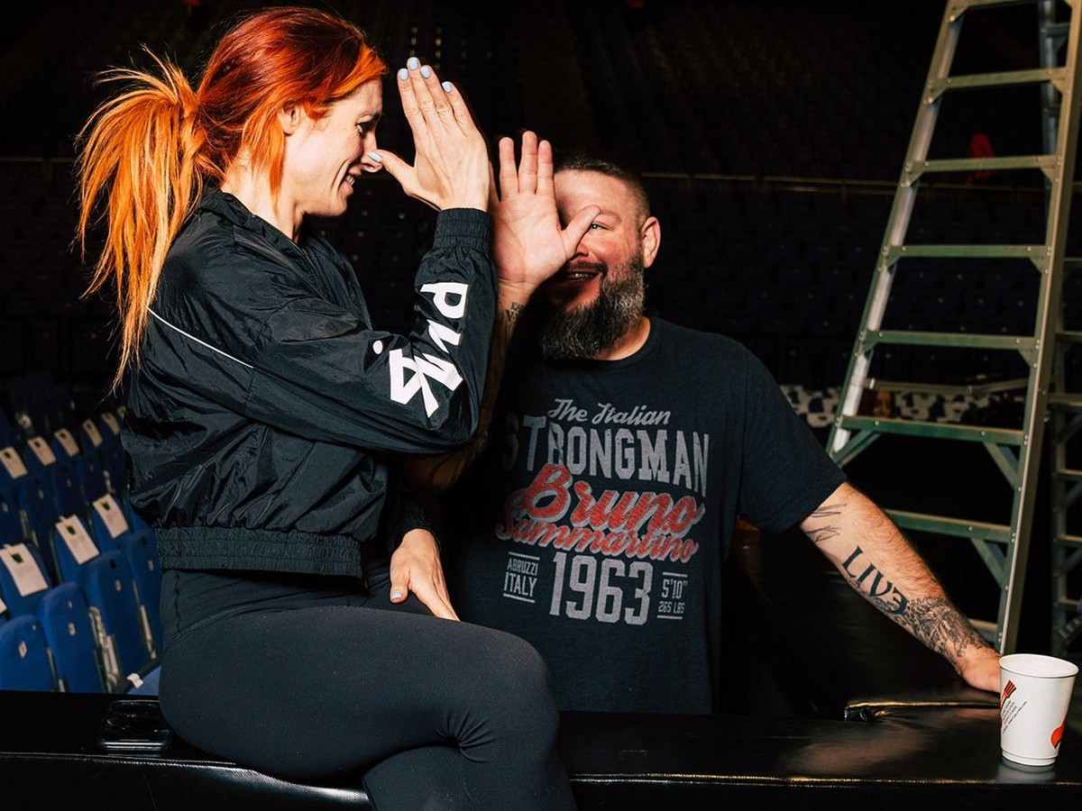 “My foot’s stuck there,” Becky Lynch gives a bizarre response to advice from Kevin Owens to kick her opponents in the balls to win Elimination Chamber