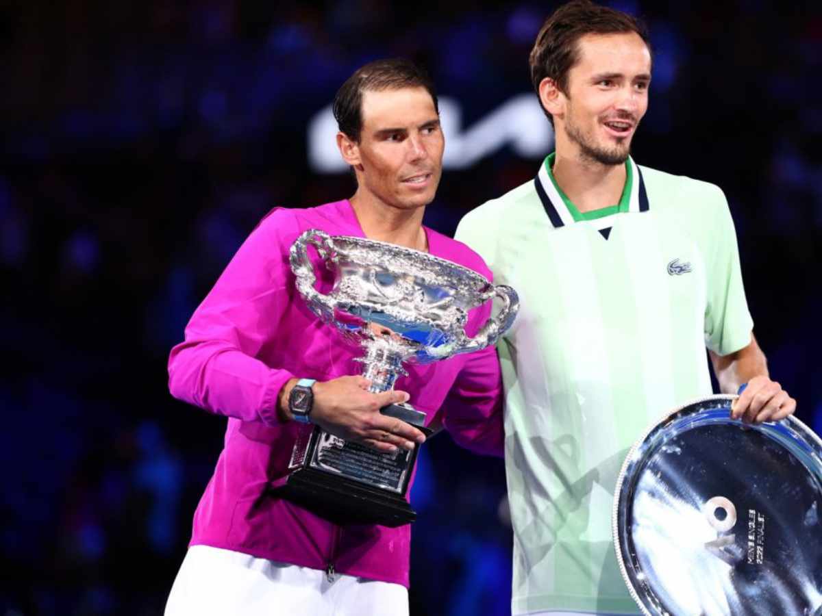 Rafael Nadal and Daniil Medvedev with their respective 2022 Australian Open titles.