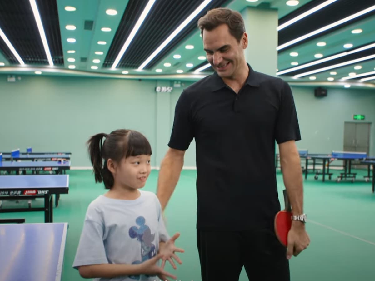 Roger Federer with the young kid Pineapple