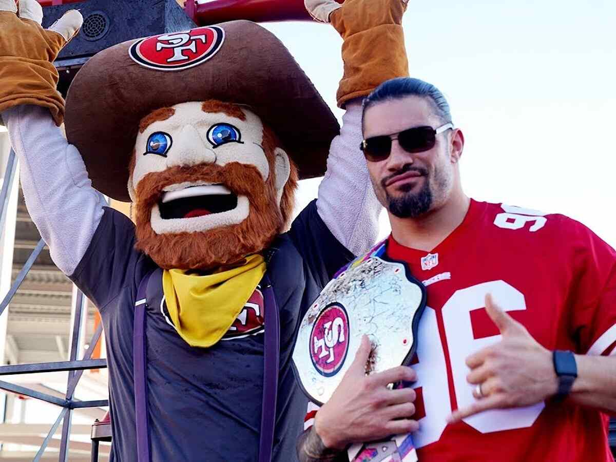 Roman Reigns with 49ers mascot, Sourdough Sam