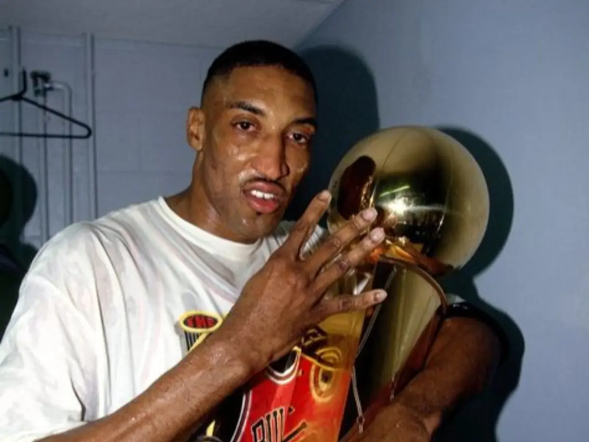 Scottie Pippen with NBA championship trophy