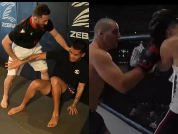 Sneako grapples with Merab Dvalihsvili in the aftermath of sparring Sean Strickland