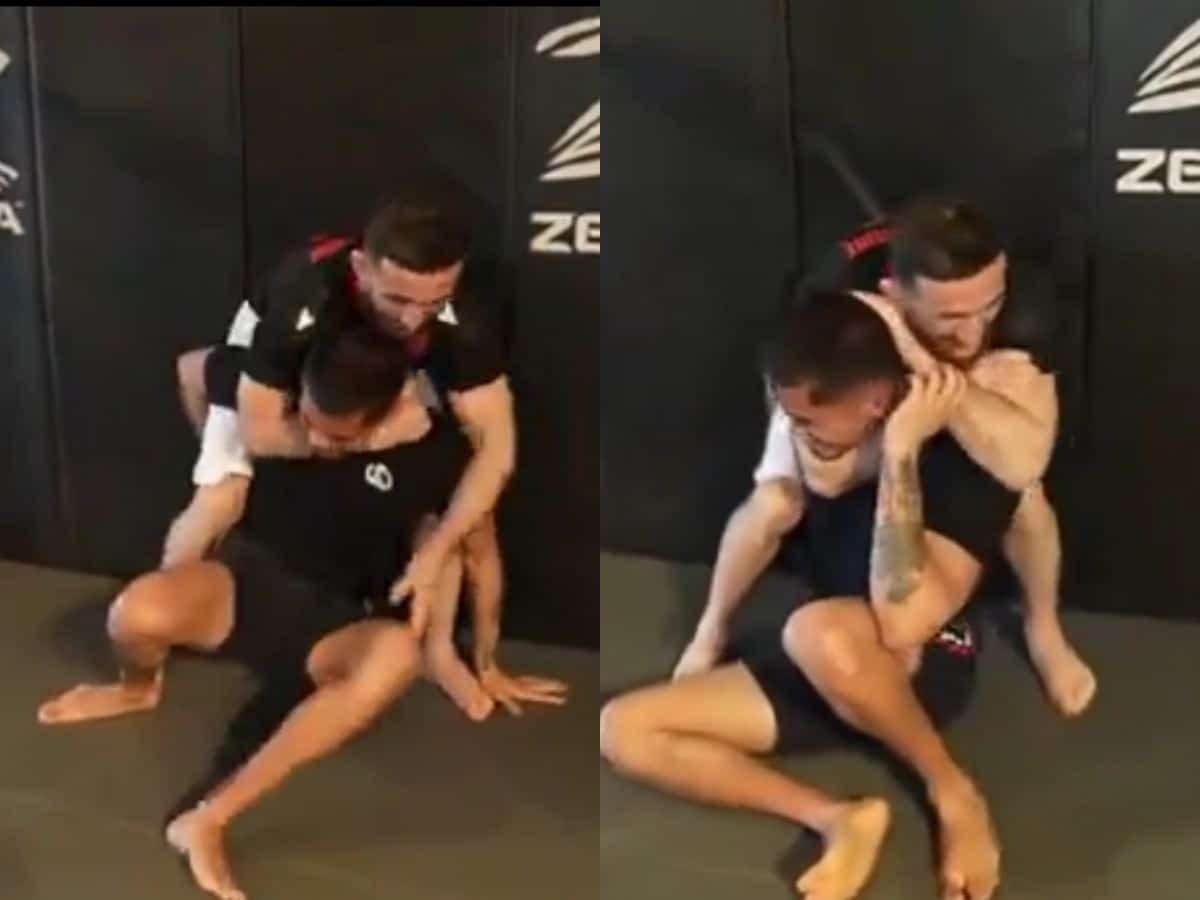 Sneako grapples with Merab Dvalihsvili in the aftermath of sparring Sean Strickland