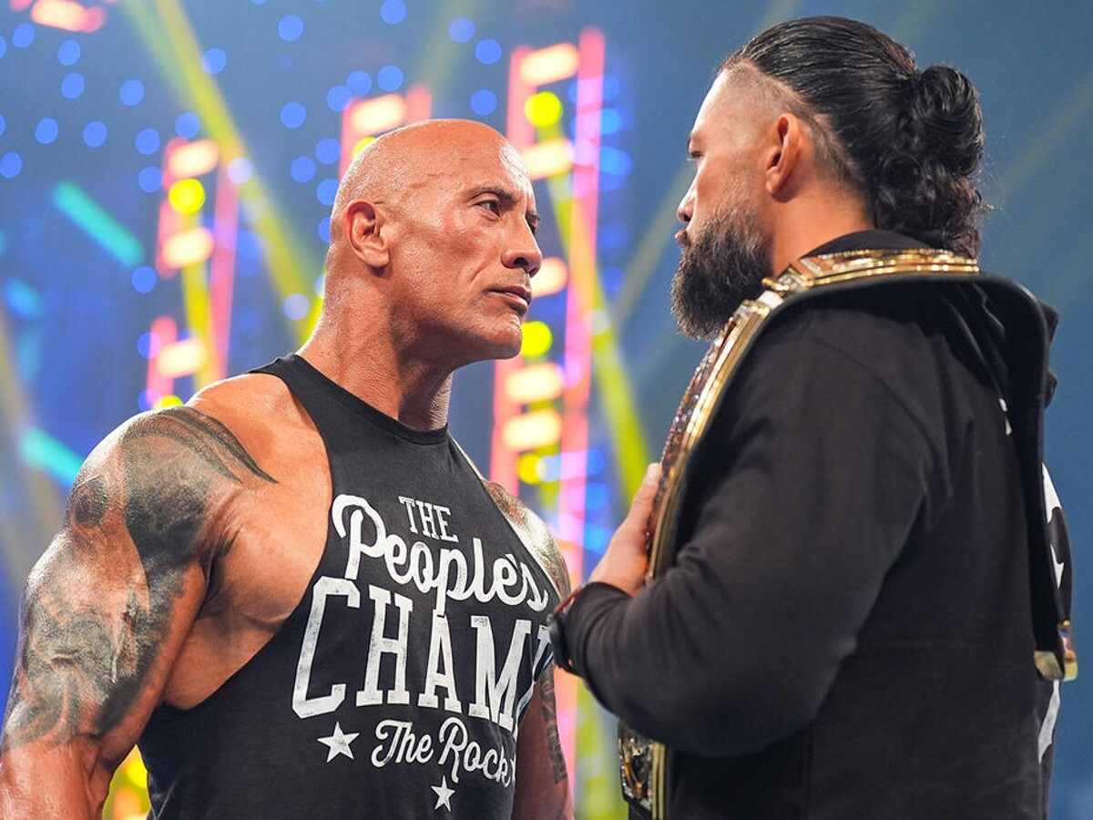 The Rock confronts Roman Reigns