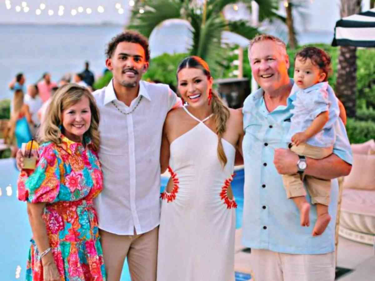 Trae Young with his wife Shelby and parents-in-law, Sherri and Mike Miller 