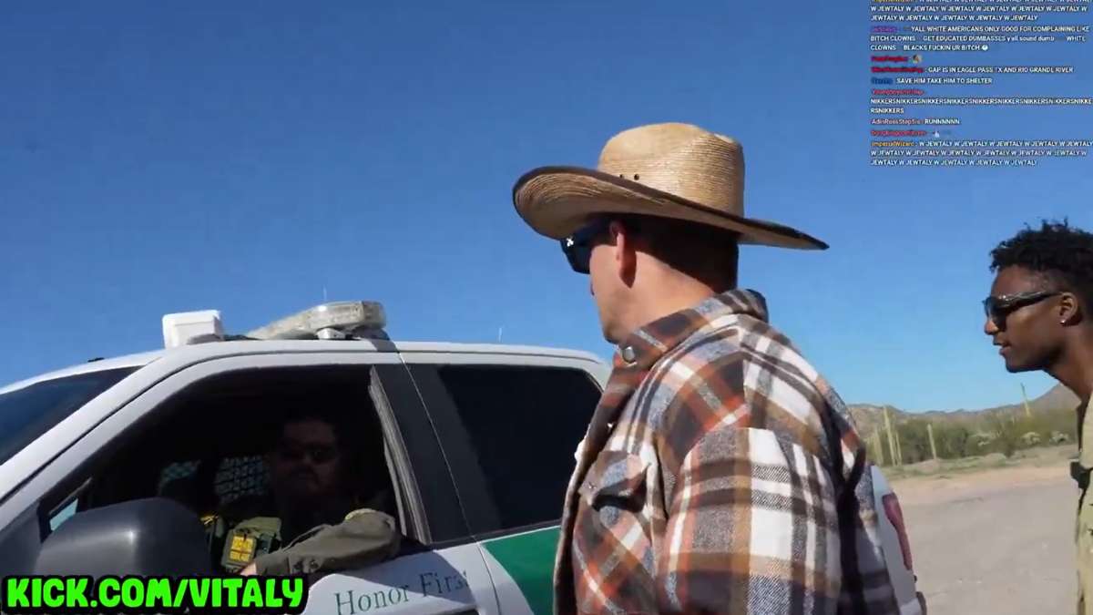 Vitaly talks to Border Patrol officer