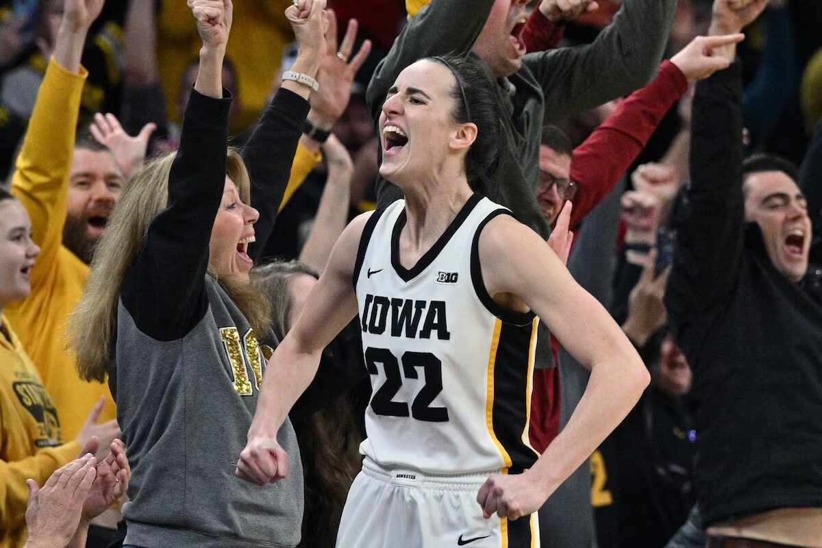 Caitlin Clark celebrating after breaking the all-time NCAA record (Via The Globe and Mail)