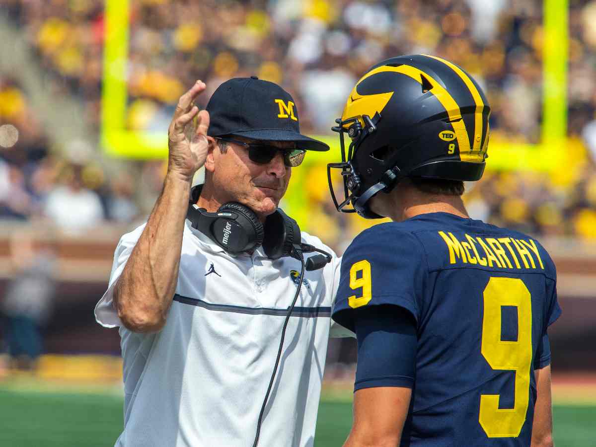 JJ McCarthy with Jim Harbaugh