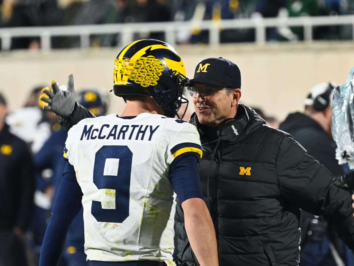 Jim Harbaugh with JJ McCarthy