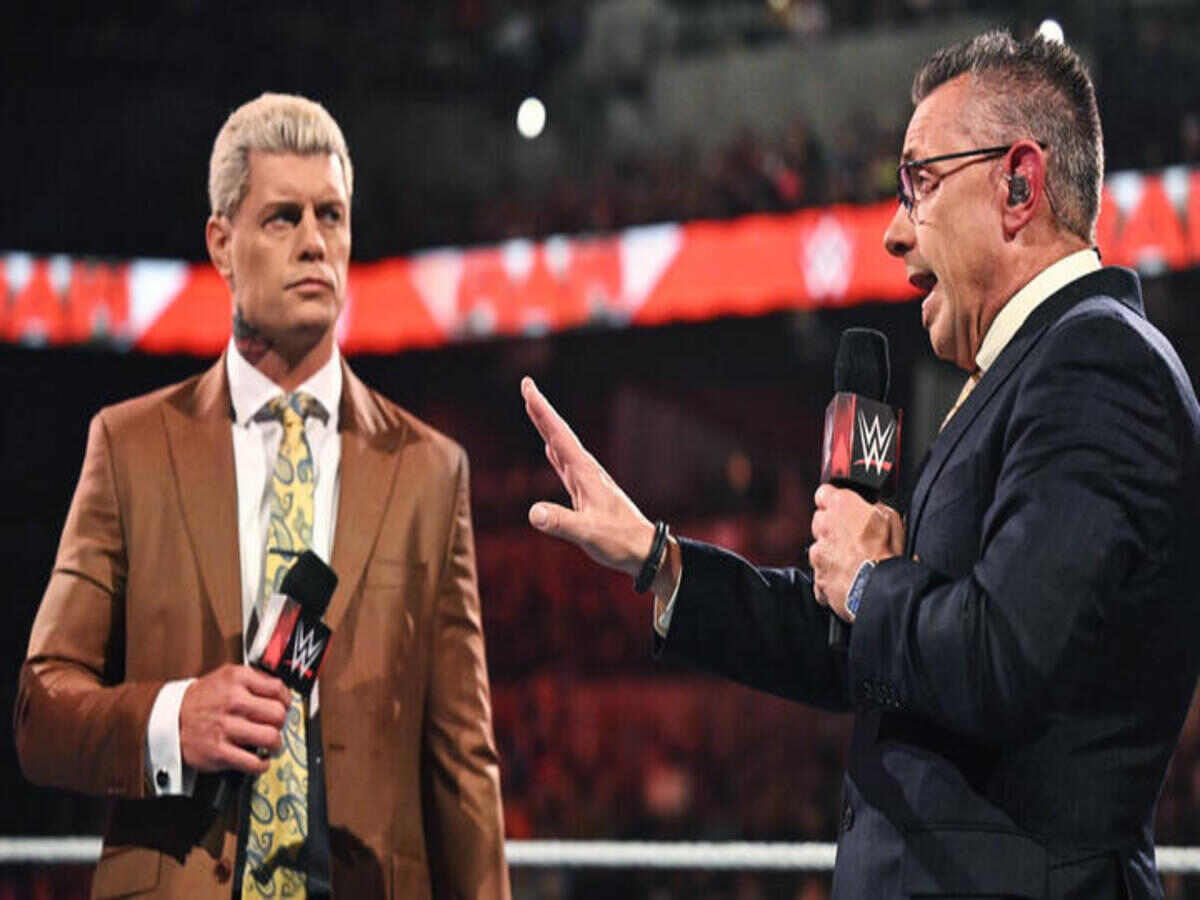 Cody Rhodes and Michael Cole