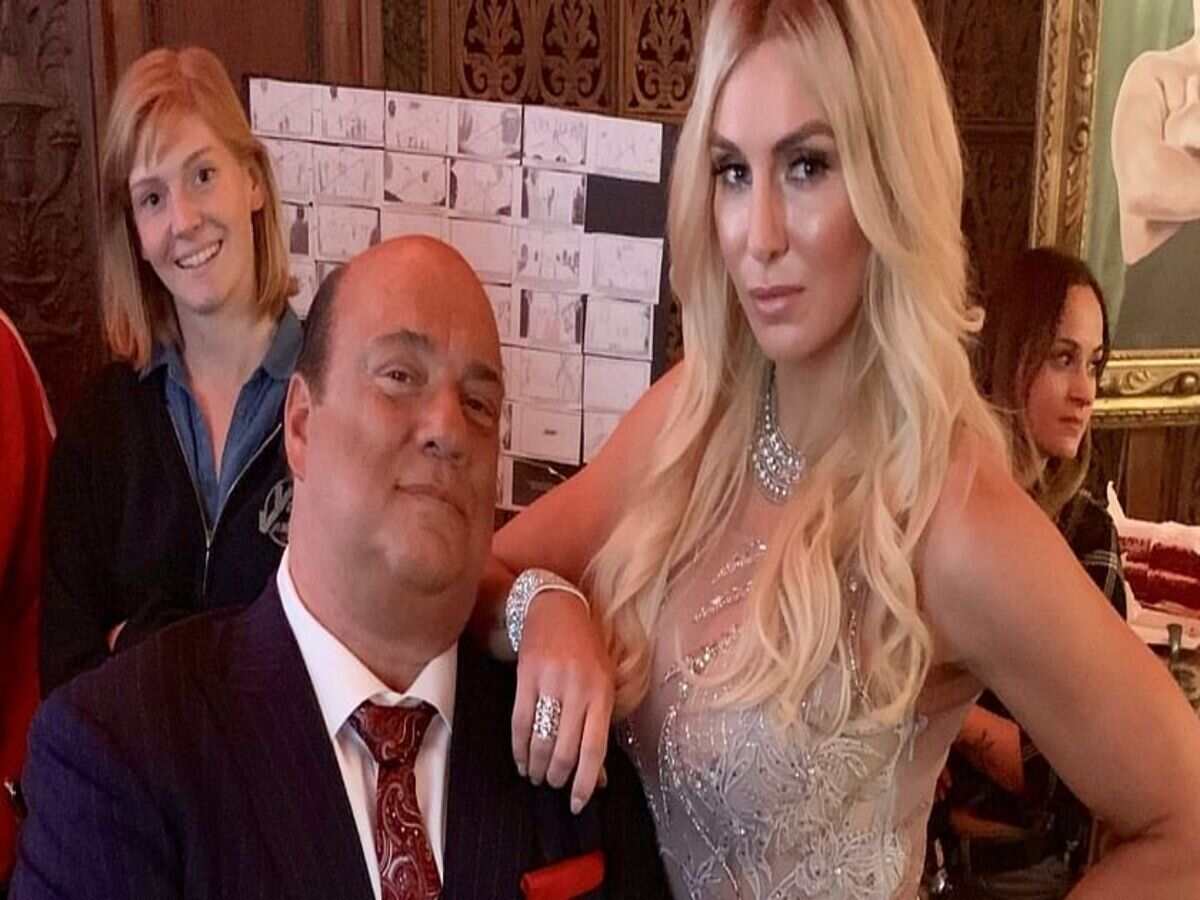 Paul Heyman and Charlotte Flair 