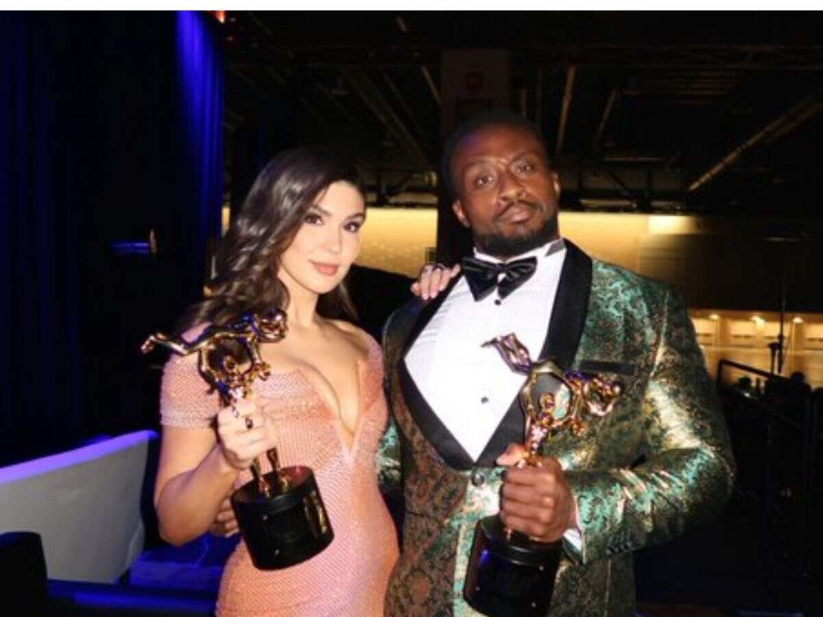 Cathy Kelley and Big E