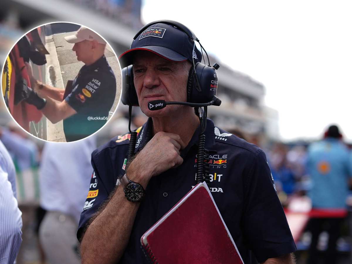 WATCH: Adrian Newey signs a Ferrari flag amidst rumors of joining Maranello