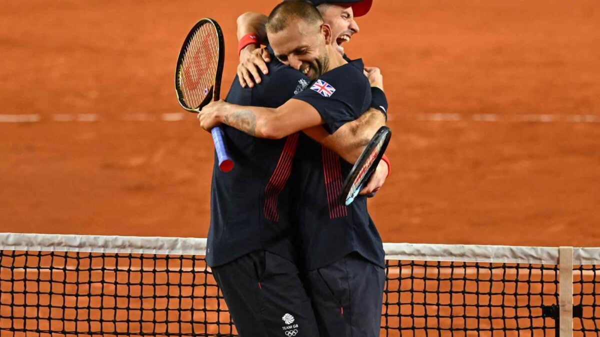 Andy Murray and Daniel Evans celebrate after winning against Belgium s Sander Gille and Joran Vliegen during their men s doubles second round tennis match on Court Suzanne-Lenglen at the Roland-Garros Stadium during the Paris 2024 Summer Olympic Games, Olympische Spiele, Olympia, OS in Paris, France on July 30