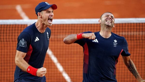 Andy Murray and Daniel Evans of Great Britain celebrate after beating Taro Daniel and Kei Nishikori of Japan at the Paris Olympics