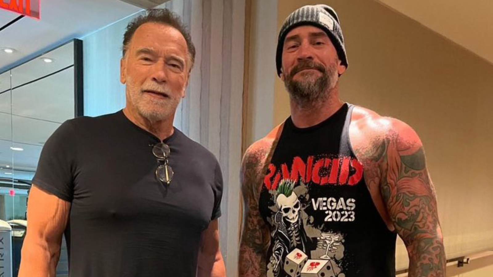 “It’s the GOAT and some clown”- WWE Universe goes wild as CM Punk gets spotted with Arnold Schwarzenegger after Raw