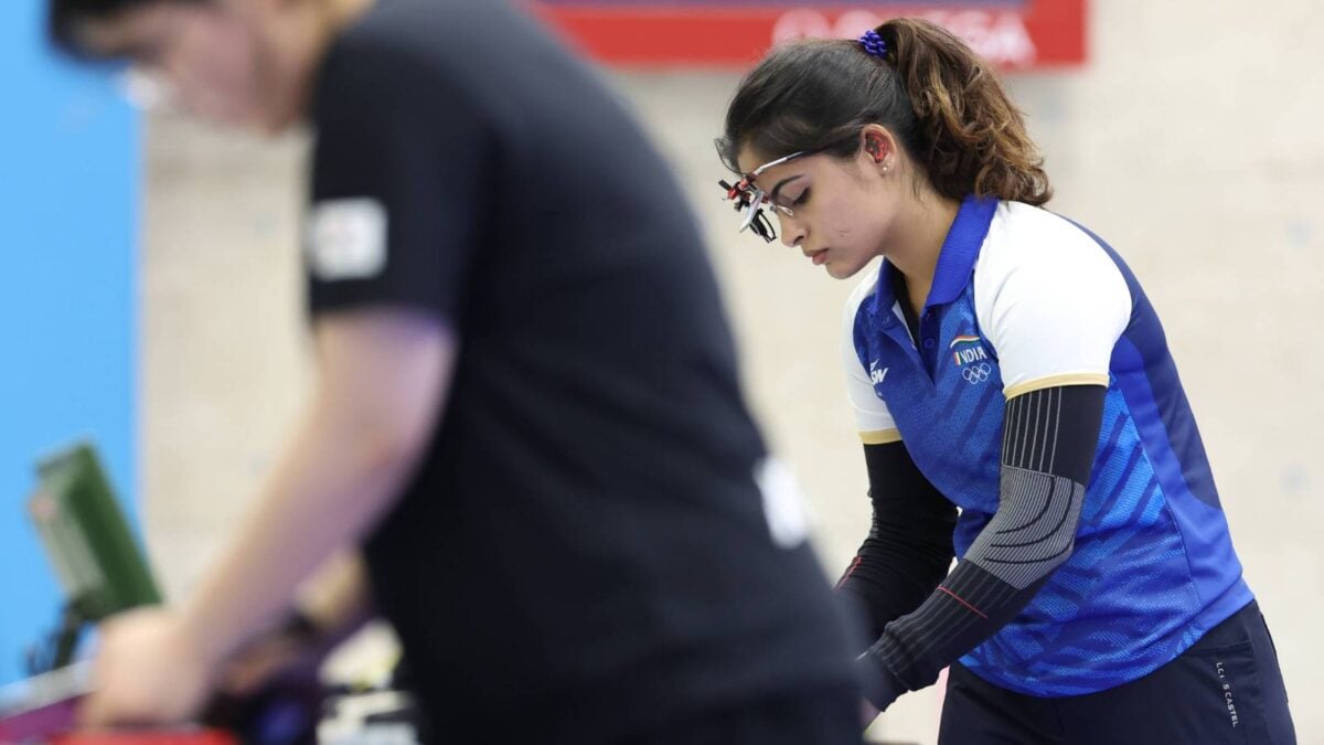 July 28, 2024 -- Manu Bhaker (R) of India reacts during the 10m air pistol women's final shooting at the Paris 2024 Olympic Games