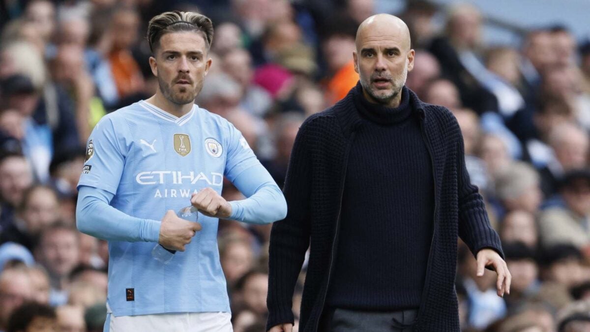 Pep Guardiola and Jack Grealish