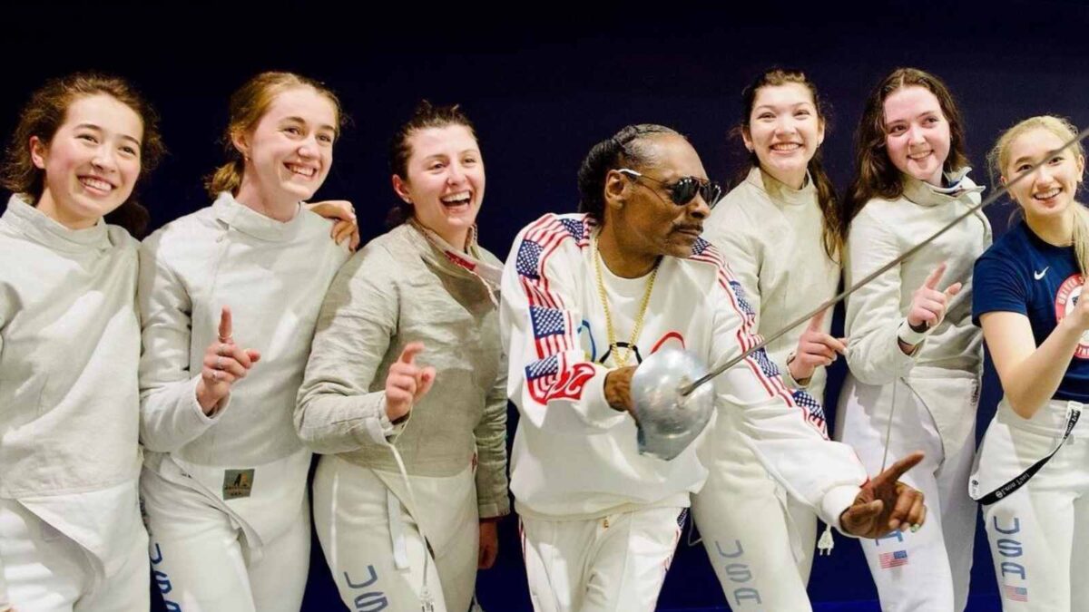 WATCH: French crowd goes WILD as Snoop Dogg carries torch at Paris Olympics