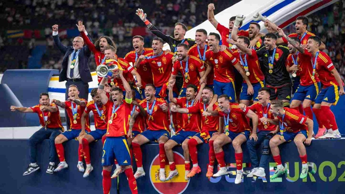 Spain celebrate their triumph against England in the final 