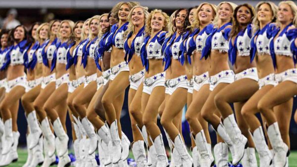 The Dallas Cowboys Cheerleaders perform during the NFC Wild Card game between the Dallas Cowboys and the Green Bay Packers on January 14, 2024 at AT&T Stadium in Arlington, Texas.