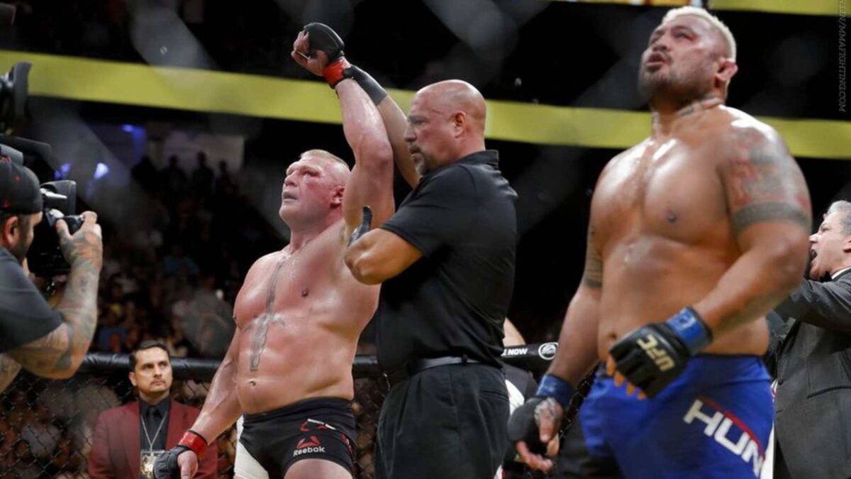 Brock Lesnar gets his hand raised against Mark Hunt at UFC 200 