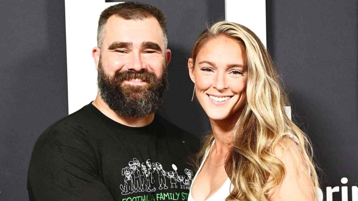 Sporting Team USA's colors, Jason Kelce roots for Women’s Field Hockey Team with wife Kylie at Paris Olympics