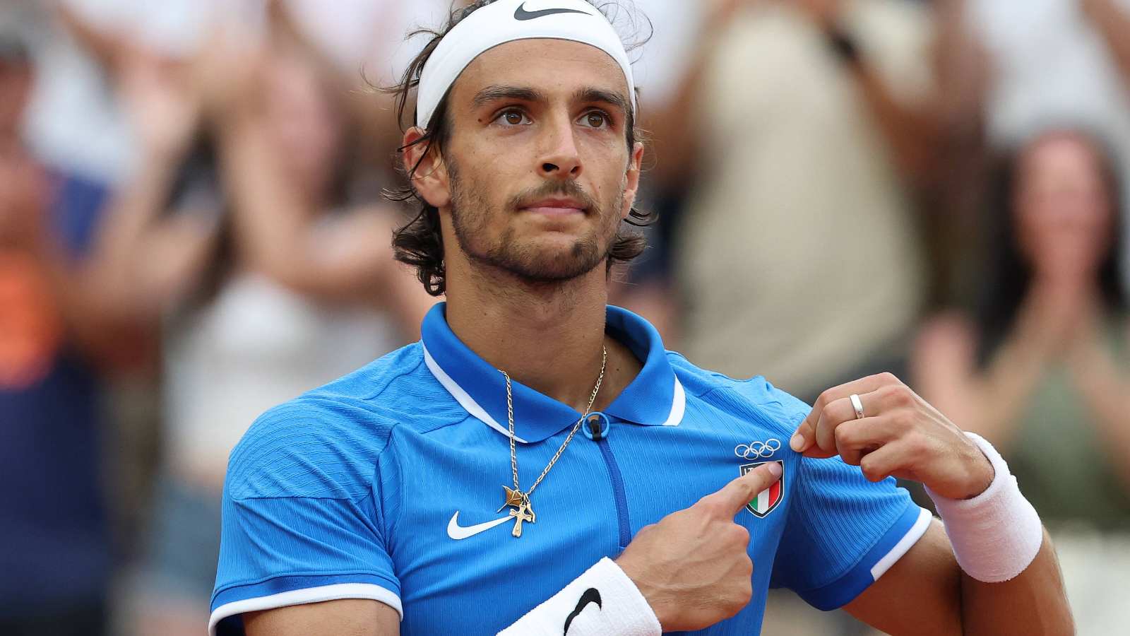 Lorenzo Musetti becomes the first Italian tennis medalist in a century after beating Felix Auger-Aliassime in three sets