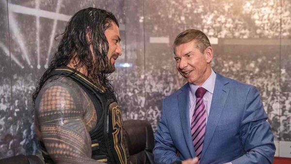 Vince McMahon and Roman Reigns