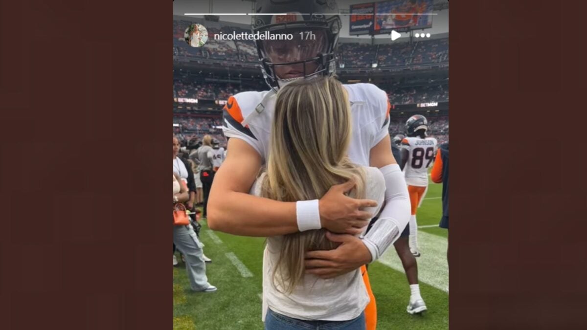 Zach Wilson embracing his fiance, Nicolette Dellanno