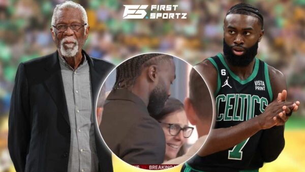 Boston Celtics Jaylen Brown comforts Jeannine Russell, widow of the late Bill Russell