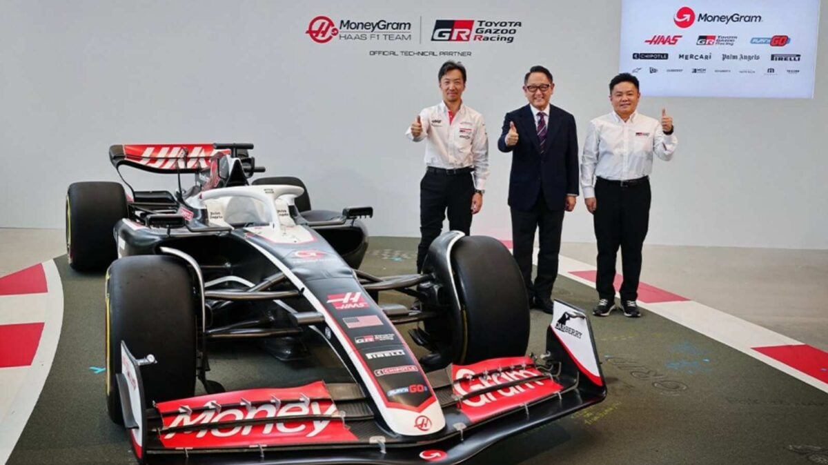 Haas F1 boss Ayao Komatsu with Toyota's Akio Toyoda and Tomoya Takahashi