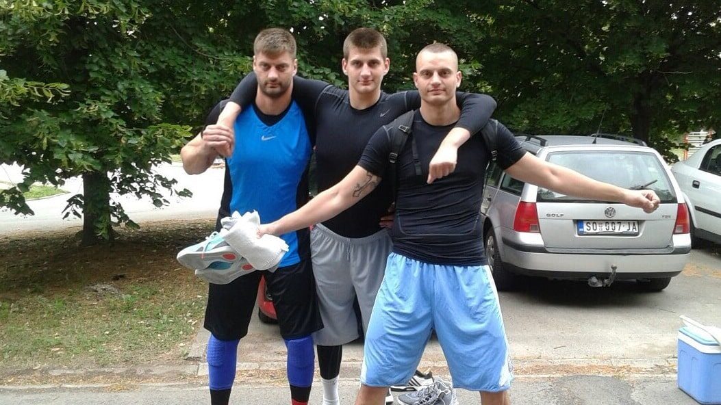 Nikola Jokic (C) and his brother