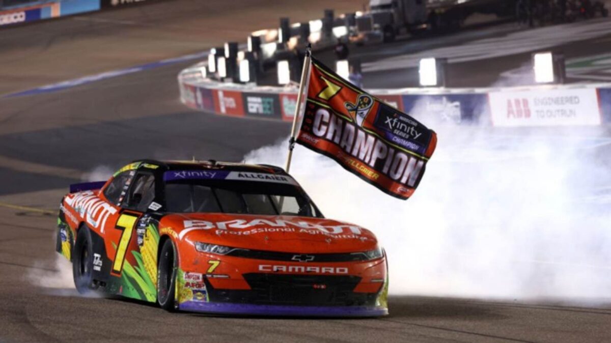 Justin Allgaier celebrating after winning the Xfinity championship