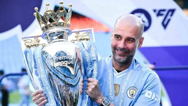 Pep Guardiola with the PL trophy