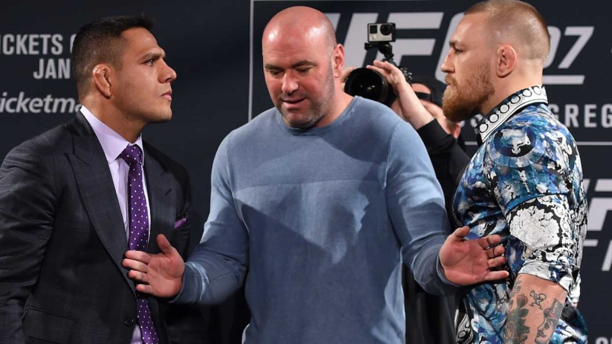 Rafael Dos Anjos and Conor McGregor facing off each other